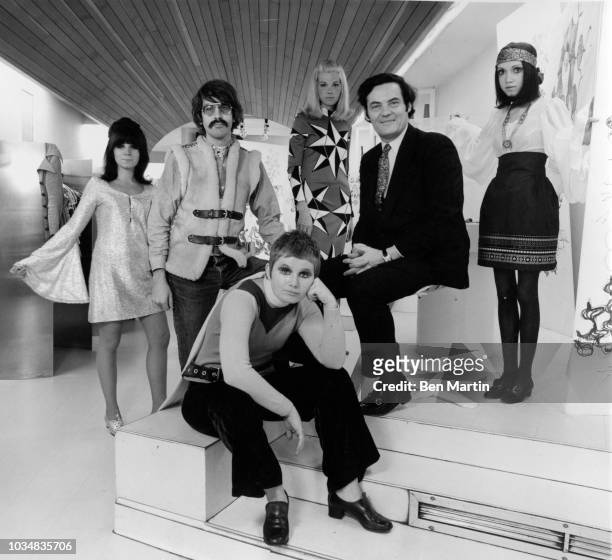 Paraphernalia President Paul Young and fashion designers Mike Mott and Betsy Johnson with three models, May 28, 1968.
