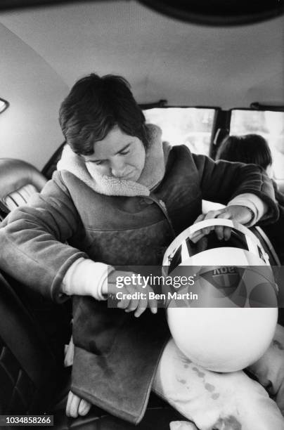 Lella Lombardi adjusting her helmet prior to her race at Brands Hatch March 27, 1975.