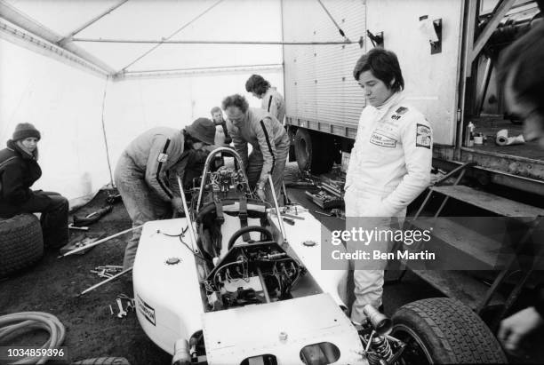 Lella Lombardi looking at her March Formula 1 before racing at Brands Hatch March 27, 1975.