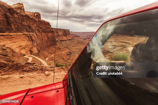 off road shafer trail in canyon near moab - four wheel drive stock pictures, royalty-free photos & images