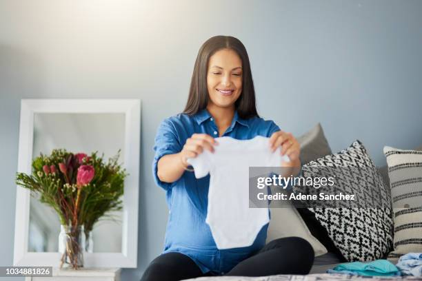 i can already picture my baby in this - baby clothing stock pictures, royalty-free photos & images