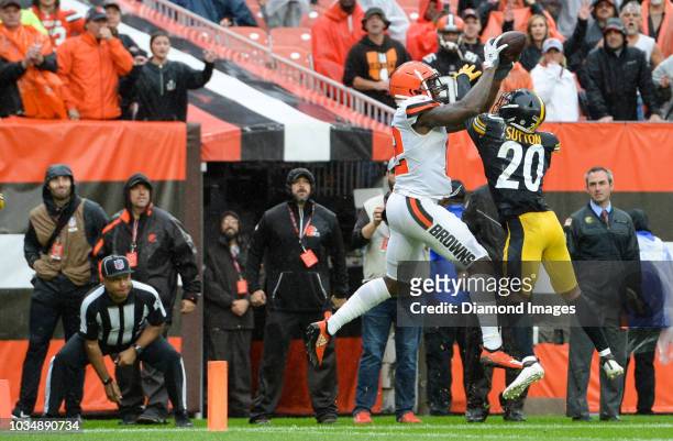Wide receiver Josh Gordon of the Cleveland Browns catches a touchdown pass against cornerback Cameron Sutton of the Pittsburgh Steelers in the fourth...