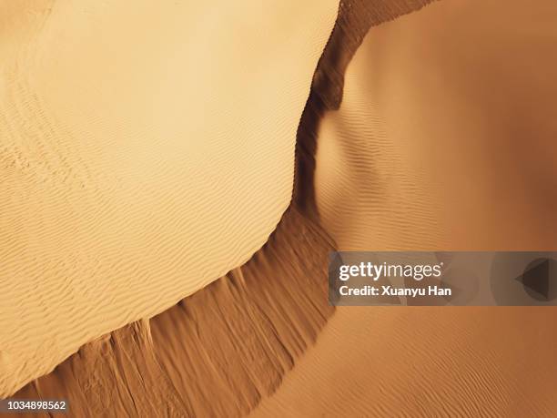 aerial view of sand dunes - gobi desert stock-fotos und bilder