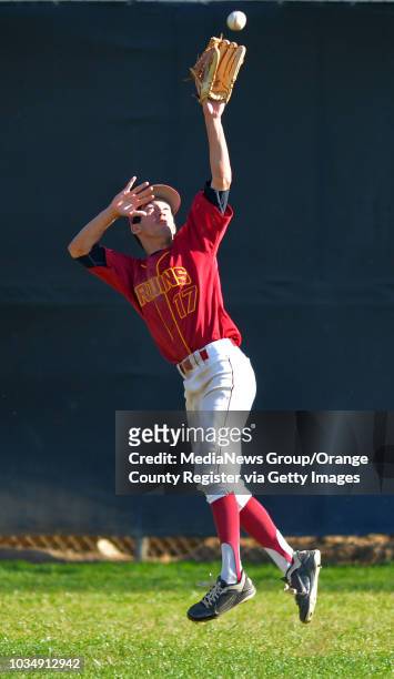 Wilson centerfielder Andrew Brown can't reach a ball hit over his head by Gahr's Jaime Estrada for a double in Long Beach, CA on Wednesday, April 2,...
