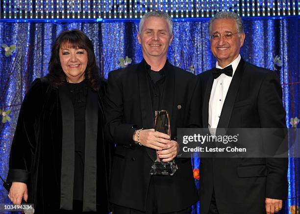 Vice President of Film/TV Relations Doreen Ringer Ross, composer Blake Neely and BMI President and CEO Del R. Bryant pose onstage during the 2010 BMI...