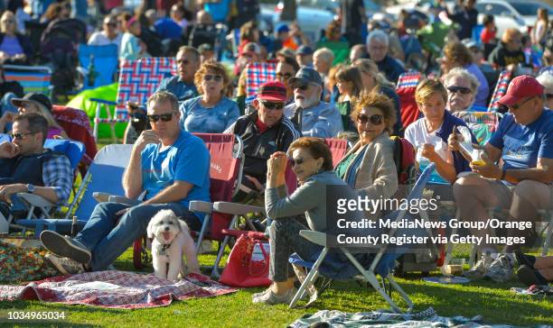 Crowd gathers before sunset to listen to a free concert at Marine Stadium Park in Long Beach, CA on Sunday, March 26, 2017. Councilwoman Suzie Price...