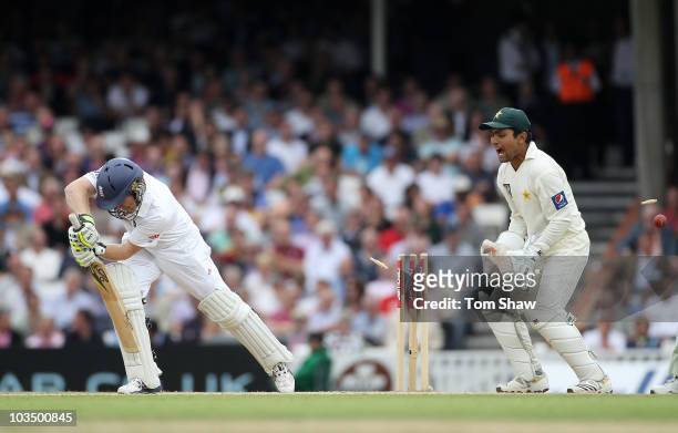 Eoin Morgan of England is bowled by Saeed Ajmal of Pakistan as wicketkeeper Kamran Akmal celebrates during day three of the npower 3rd Test Match...