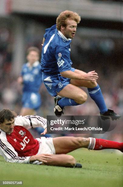 December 1991 - Football League Division One - Arsenal v Everton - Maurice Johnston of Everton is tackled by Tony Adams of Arsenal -