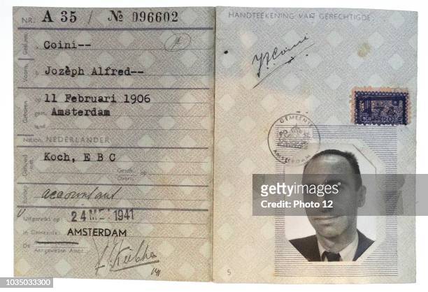 Identity document of a Dutch Jew with the letter J marked next to his surname to indicate his Jewish ethnicity, during the Nazi occupation of Holland...