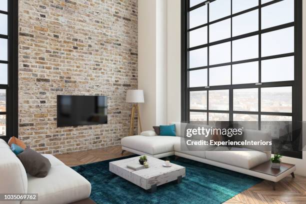 loft-wohnung-wohnzimmer mit großbild-tv led - table brick wall wood stock-fotos und bilder