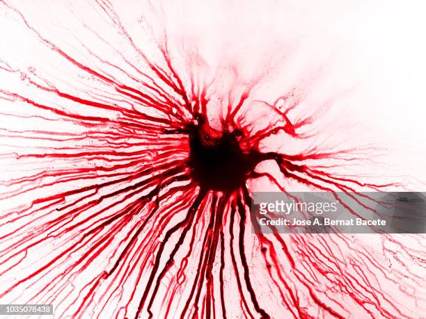 full frame of the textures formed of a drop of bleeds on a white background. - graphic accident photos stock pictures, royalty-free photos & images