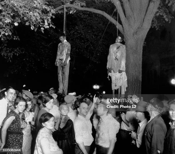 The lynching of Thomas Shipp and Abram Smith. The African-Americans were arrested as suspects, accused for robbery, murder and rape. An angry mob...