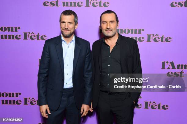 Guillaume Canet and Gilles Lellouche attend "L'amour Est Une Fete" Paris Premiere at Cinema Max Linder on September 17, 2018 in Paris, France.