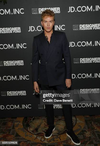 Fletcher Cowan attends the BFC/Vogue Designer Fashion Fund in partnership with JD.com, Inc, China's largest retailer, with a cocktail party in London...