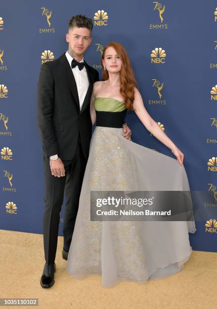 Travis Mills and Madelaine Petsch attend the 70th Emmy Awards at Microsoft Theater on September 17, 2018 in Los Angeles, California.