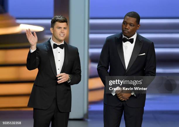 Colin Jost and Michael Che speak onstage during the 70th Emmy Awards at Microsoft Theater on September 17, 2018 in Los Angeles, California.