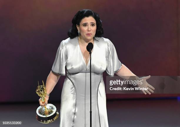 Alex Borstein accepts the Outstanding Supporting Actress in a Comedy Series award for 'The Marvelous Mrs. Maisel' onstage during the 70th Emmy Awards...