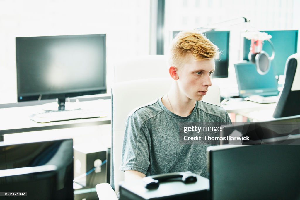 Engineer coding in computer lab