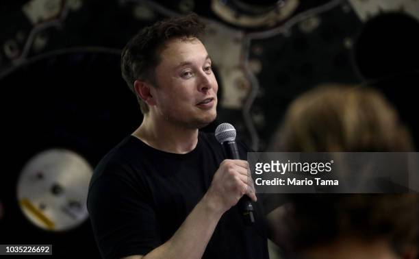 SpaceX CEO Elon Musk speaks at a press conference where he announced the Japanese billionaire chosen by the company to fly around the moon, on...