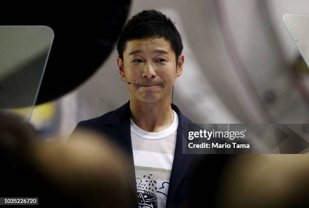 Yusaka Maezawa, the Japanese billionaire chosen by SpaceX CEO Elon Musk to fly around the moon, listens to a question on September 17, 2018 in...