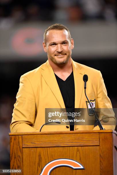 Brian Urlacher is honored with a Ring of Excellence ceremony for his recent induction into the Hall of Fame at Soldier Field on September 17, 2018 in...