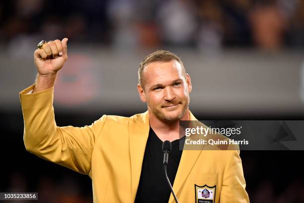 Brian Urlacher is honored with a Ring of Excellence ceremony for his recent induction into the Hall of Fame at Soldier Field on September 17, 2018 in...