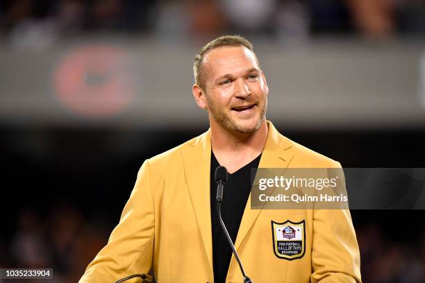 Brian Urlacher is honored with a Ring of Excellence ceremony for his recent induction into the Hall of Fame at Soldier Field on September 17, 2018 in...