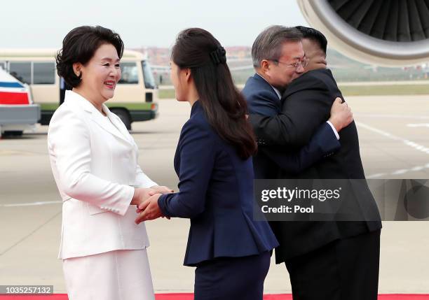 South Korean President Moon Jae-in and his wife Kim Jung-sook are welcomed by North Korean leader Kim Jong Un and his wife Ri Sol Ju upon their...