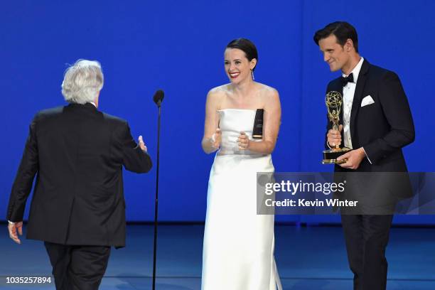 Henry Winkler accepts the Outstanding Supporting Actor in a Comedy Series award for 'Barry' from Claire Foy and Matt Smith onstage during the 70th...
