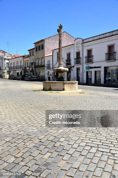 montemor-o-novo - 5 de outubro street and the 'rua nova' fountain, alentejo, portugal - evora stock pictures, royalty-free photos & images