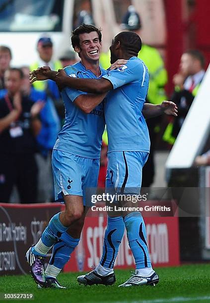 Gareth Bale of Tottenham celebrates his second goal with Wilson Palacios during the Barclays Premier League match between Stoke City and Tottenham...