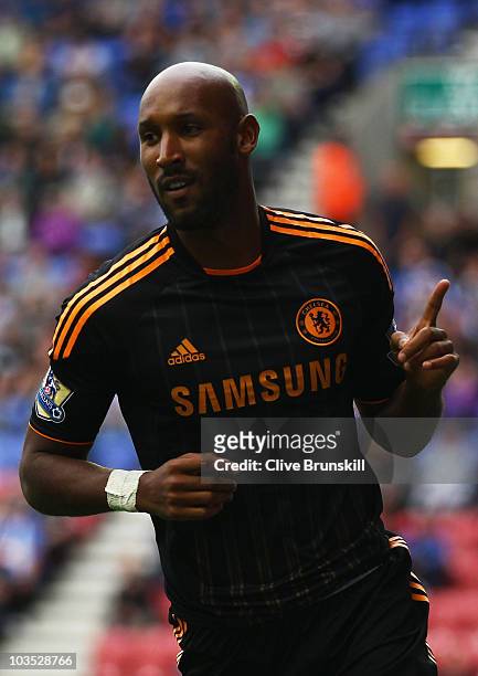 Nicolas Anelka of Chelsea celebrates as he scores their second goal during the Barclays Premier League match between Wigan Athletic and Chelsea at DW...