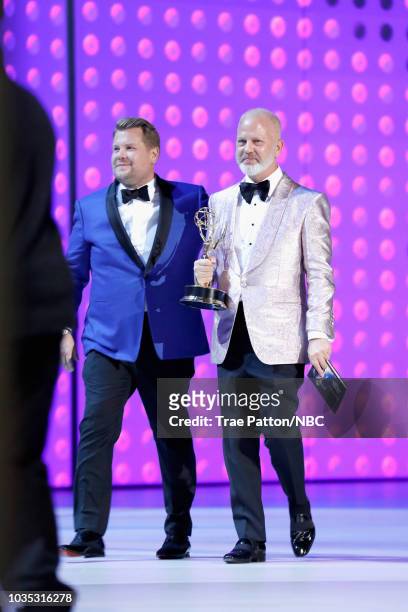 70th ANNUAL PRIMETIME EMMY AWARDS -- Pictured: TV personality James Corden walks offstage with writer/director Ryan Murphy, winner of Outstanding...