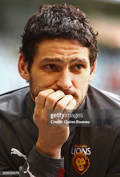 Brendan Fevola of the Lions looks on from the crowd during the round 21 AFL match between the Essendon Bombers and the Brisbane Lions at Etihad...