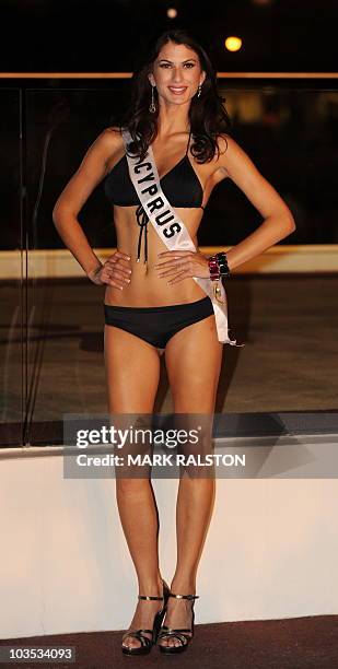 Miss Cyprus Demetra Olymbiou poses for photographers during the Miss Universe 2010 Contestant Swimsuit Event at the Mandalay Bay Hotel in Las Vegas...