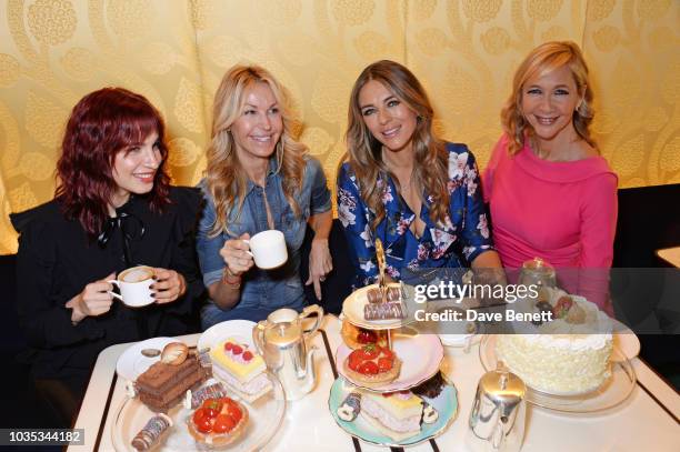 Nikita Andrianova, Melissa Odabash, Elizabeth Hurley and Tania Bryer attend the World's Biggest Coffee Morning hosted by Elizabeth Hurley in support...