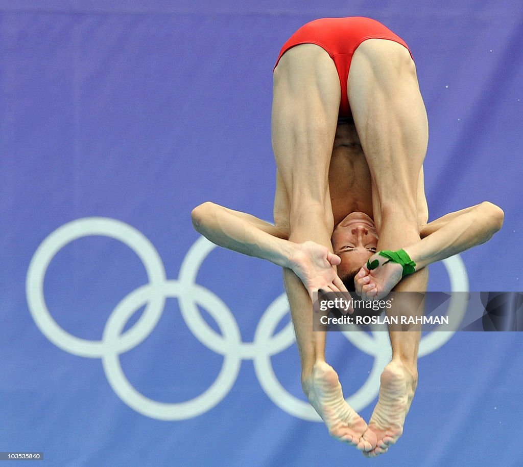 Pyritz Pools Tim Pyritz of Germany dives in the youth men's 3m springboard... News ...
