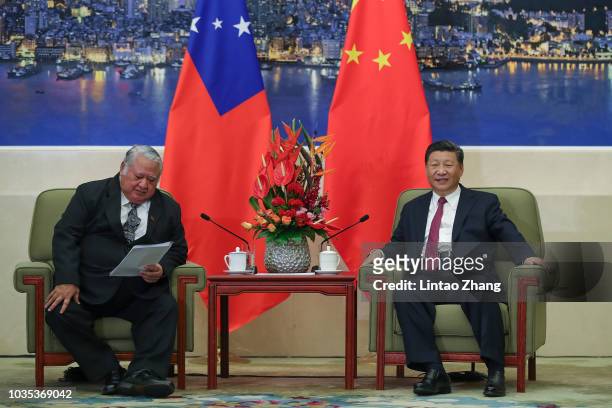 Samoa Prime Minister Tuilaepa Lupesoliai Sailele Malielegaoi meets with Chinese President Xi Jinping at The Great Hall Of The People on September 18,...