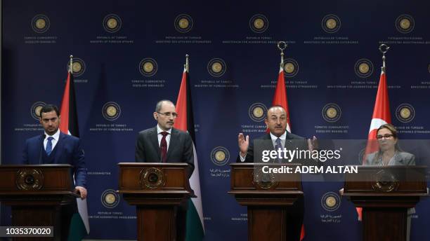 Turkish Foreign Affairs Minister Mevlut Cavusoglu talks during a joint press conference with Jordan Foreign Affairs minister Ayman Safadi , Turkish...