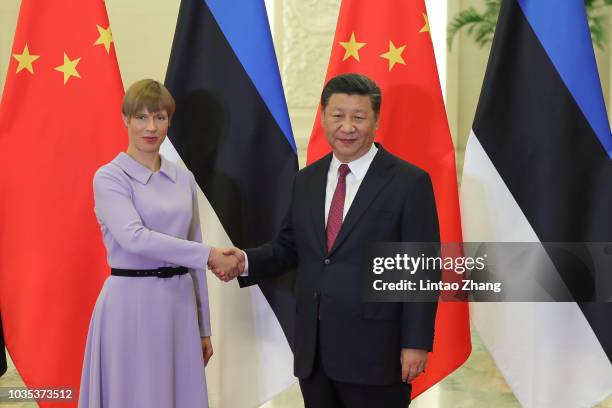 President of Estonia, Kersti Kaljulaid shakes hands with Chinese President, Xi Jinping at The Great Hall Of The People on September 18, 2018 in...