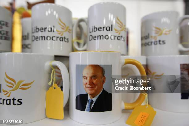 Political party merchandise sits for sale at the Liberal Democrat Party annual conference in Brighton, U.K., on Tuesday, Sept. 18, 2018. Leader of...