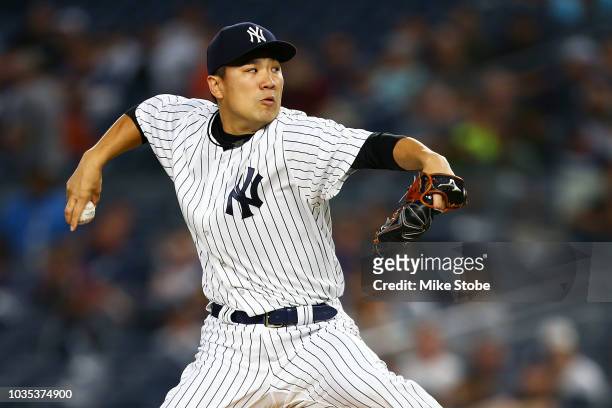 Masahiro Tanaka of the New York Yankees pitches in the first inning against the Toronto Blue Jays at Yankee Stadium on September 14, 2018 in the...