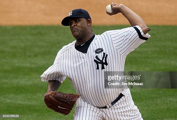 Sabathia of the New York Yankees delivers a pitch against the Seattle Mariners on August 22, 2010 at Yankee Stadium in the Bronx borough of New York...