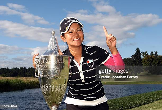 Ai Miyazato poses with the trophy after winning the Safeway Classic at Pumpkin Ridge Golf Club on August 22, 2010 in North Plains, Oregon. Miyazato...