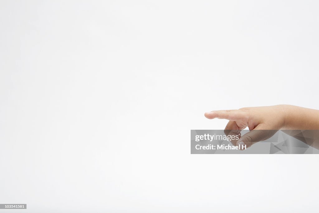 Hand of child who indicates his finger