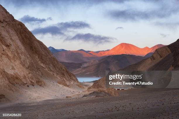 aerial view of mountain range around entrance of pangong lake in ladakh region, india - china india border stock pictures, royalty-free photos & images