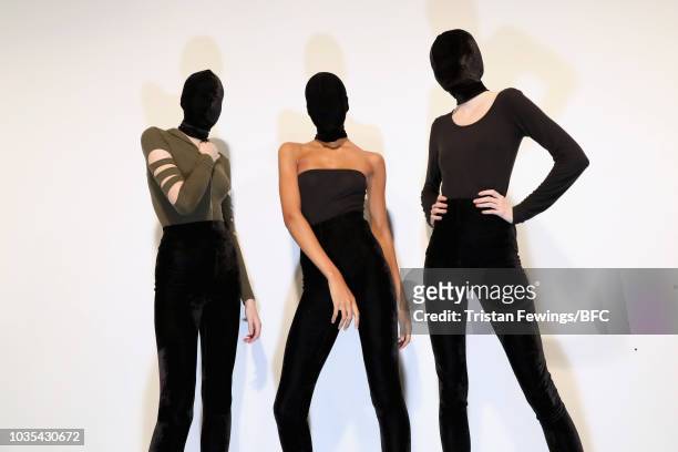 Models backstage ahead of the Richard Quinn show during London Fashion Week September 2018 on September 18, 2018 in London, England.