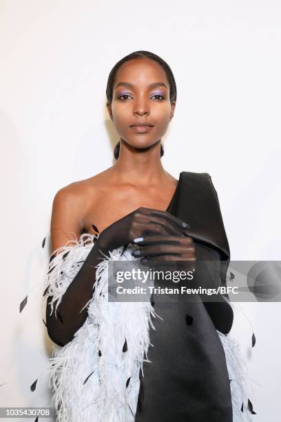 Model backstage ahead of the Richard Quinn show during London Fashion Week September 2018 on September 18, 2018 in London, England.