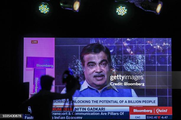 Nitin Gadkari, India's minister of shipping, road transport and highway water resources, is displayed on a monitor as he speaks during the Bloomberg...
