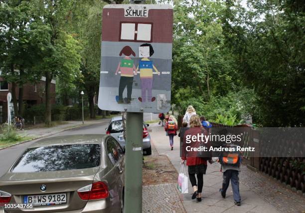 Children walk down the way on the first school day on August 23, 2010 in Berlin, Germany. Many German school districts, including those in Berlin,...